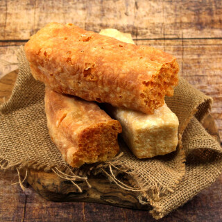 Knuspergold Hundekäse 10 x 100 g gepufft